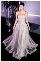 Cinderella Divine CD940 Cut from layered glitter tulle, this dress features radiating linear platinum beading throughout,